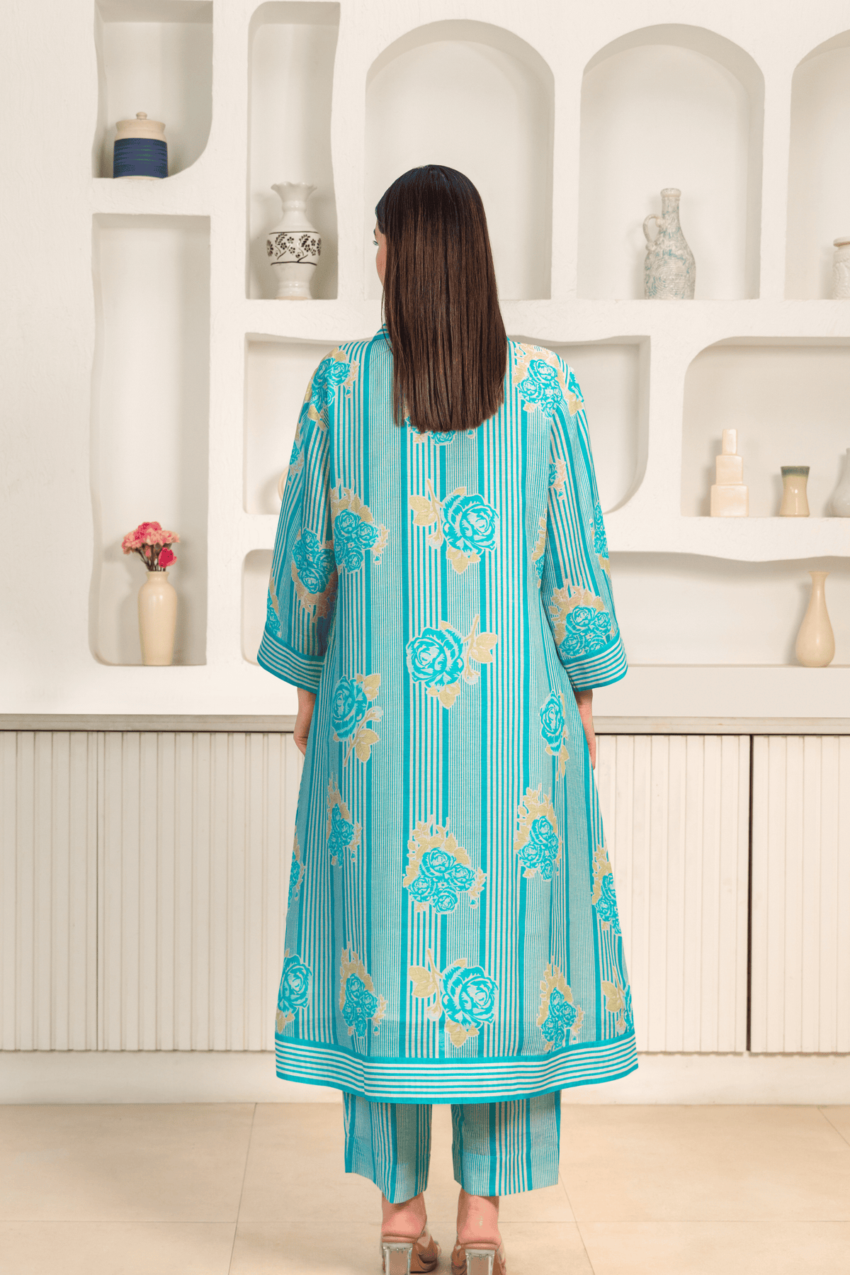 Back View of women wearing blue floral printed Radiance Linen Premium Co-ord Set with a contemporary design