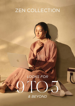 A woman sits on the floor wearing a dusty rose pink long-sleeve co-ord set dress while using a silver laptop. The scene is styled with warm, directional sunlight casting shadows on a beige wall, with the text 'ZEN COLLECTION' at the top and 'LOOKS FOR 9 TO 5 & BEYOND' at the bottom.