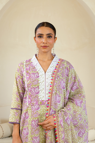 Closeup view of a woman wearing a lavender handcrafted kurta with intricate patterns, white detailing, and paired with striped lavender pants, reflecting timeless ethnic elegance