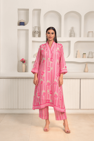 Pink floral patterned kurta set with loose pants, featuring a chic and modern design, perfect for casual wear.






