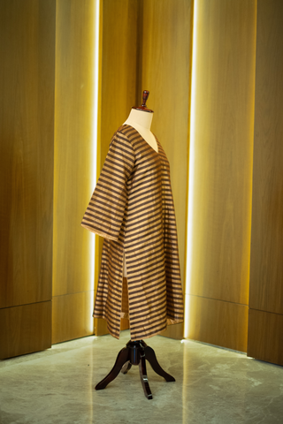 right side view of black and gold striped kurta paired with a sheer
