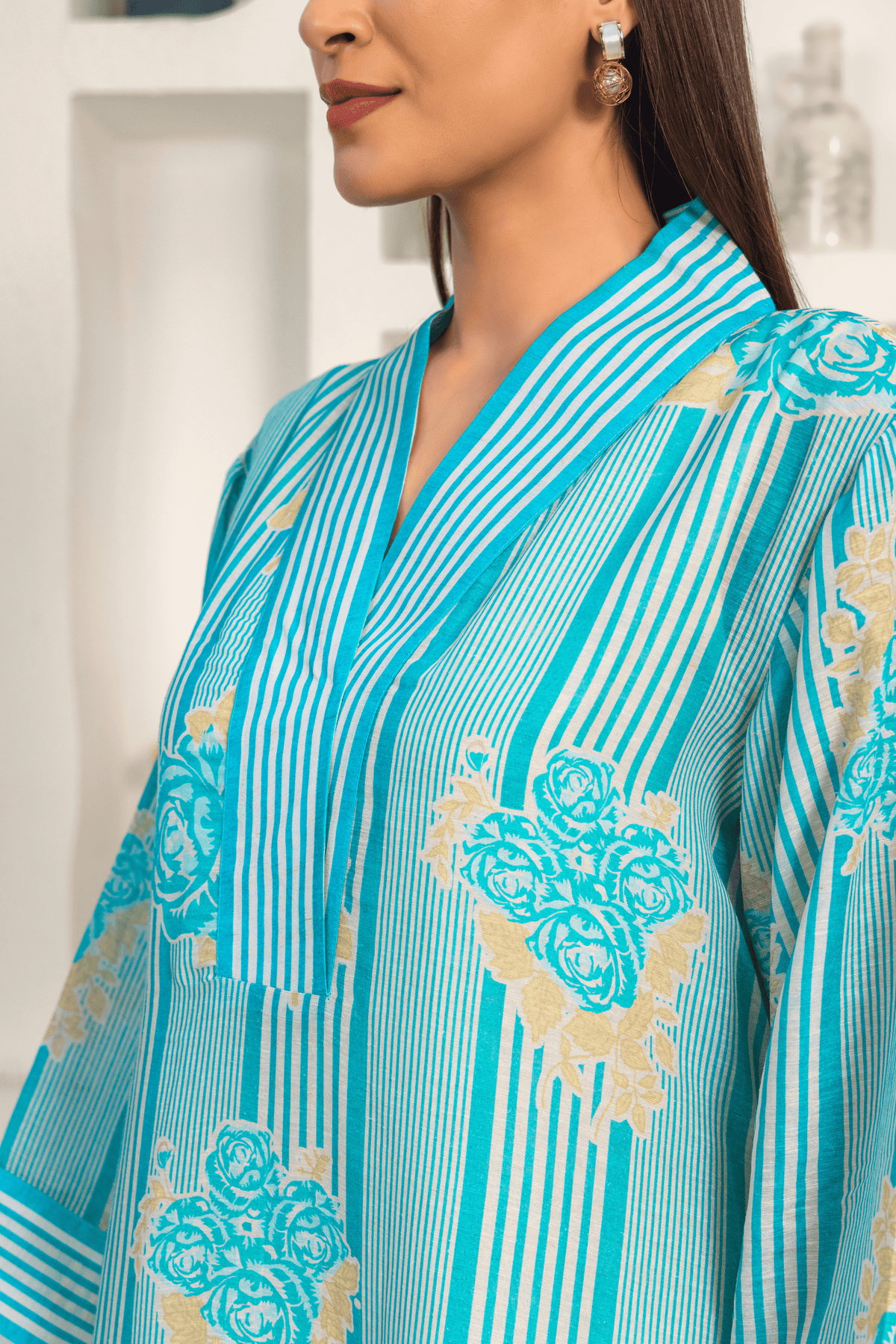 Closeup View of women wearing blue floral printed Radiance Linen Premium Co-ord Set with a contemporary design